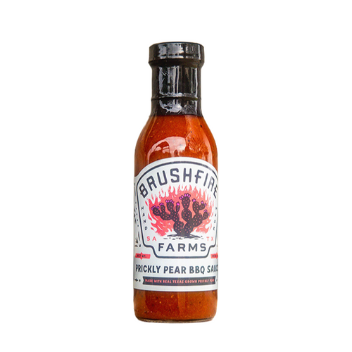 Bottle of Brushfire Farms prickly pear BBQ sauce on a white background