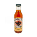 Bottle of Brushfire Farms Glaze featuring a vibrant label with a cactus design, showcasing the original glaze product.